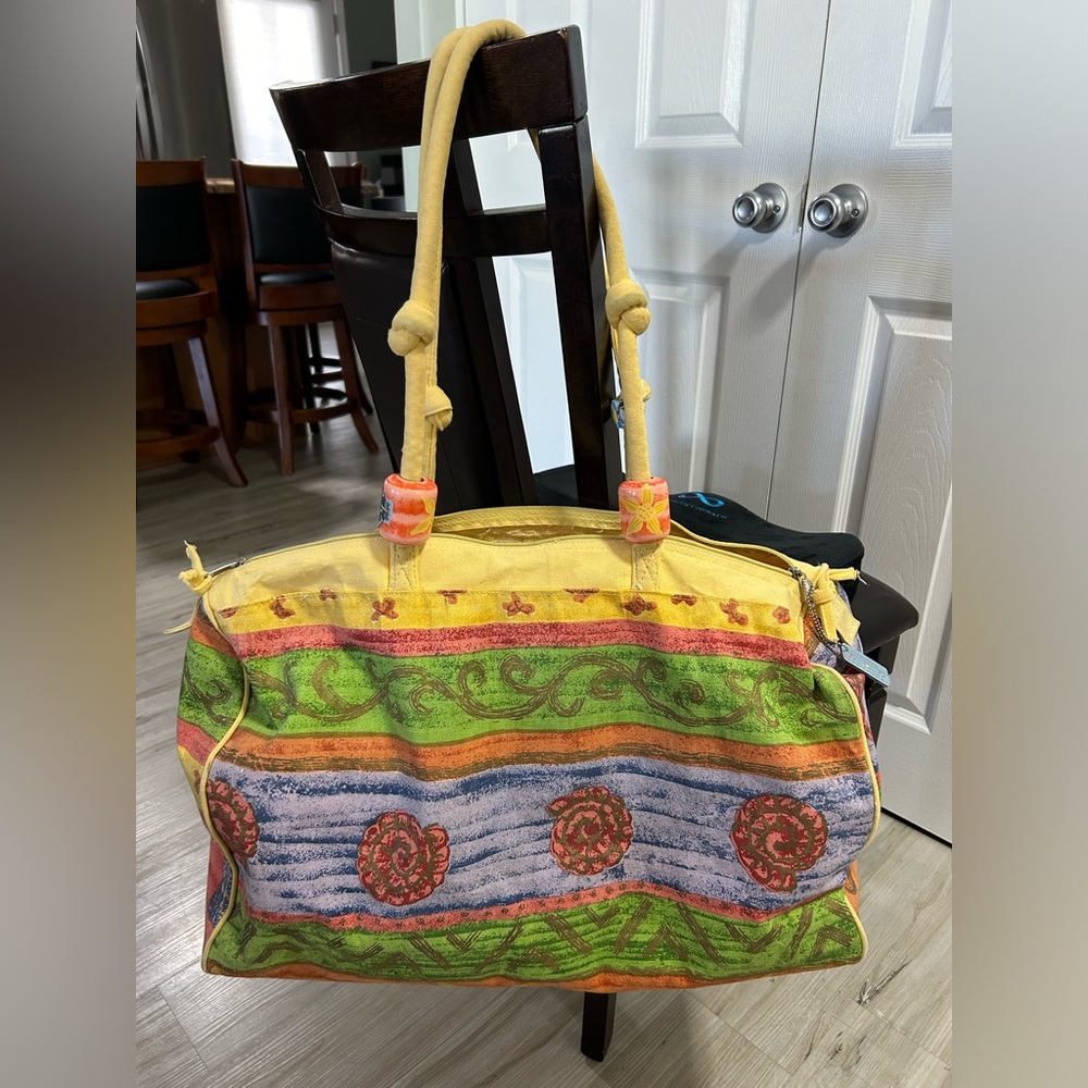 Multicolored Sun-n-sand x-large travel bag in fun, colorful print. $20